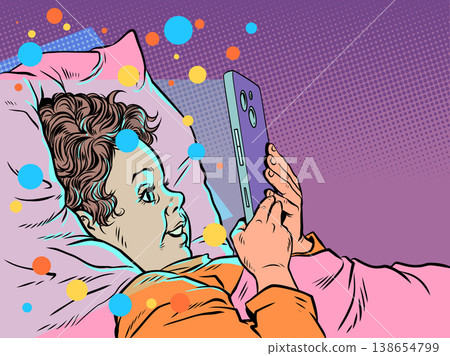 Pop Art Retro A child staring at a phone in bed. Parenting and the dangers of technology. Children's emotions about mobile phones at night. Pop Art Retro A child staring at a phone in bed. Parenting and the dangers of technology. Children's emotions about mobile phones at night. 138654799