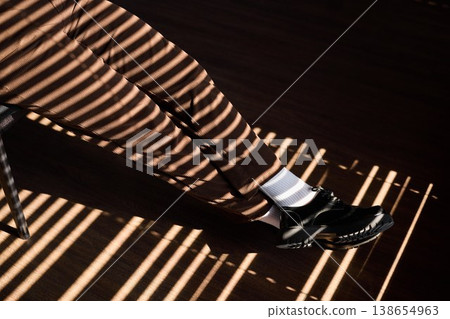 Serene professional prepares confidently for important speech Serene professional prepares confidently for important speech 138654963