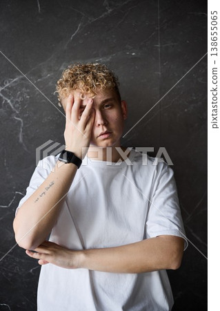 Tense scene rehearsal by blonde male actor with introspective mood Tense scene rehearsal by blonde male actor with introspective mood 138655065
