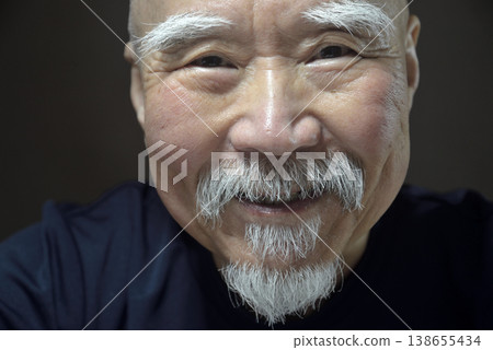 The smile of a bearded old man The smile of a bearded old man 138655434