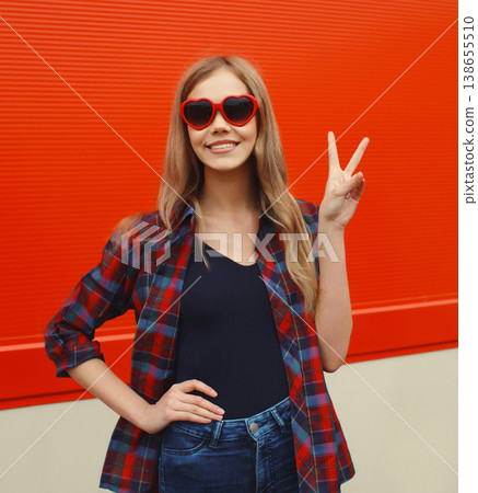 happy young woman with red sunglasses, smiling girl in the city happy young woman with red sunglasses, smiling girl in the city 138655510