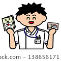 A male nurse holding an insurance card and medication record book. 138656171
