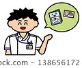 A male nurse is checking the health insurance card and other cards. 138656172