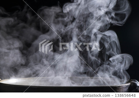 Steam and vapor rising from the pot Steam and vapor rising from the pot 138656648