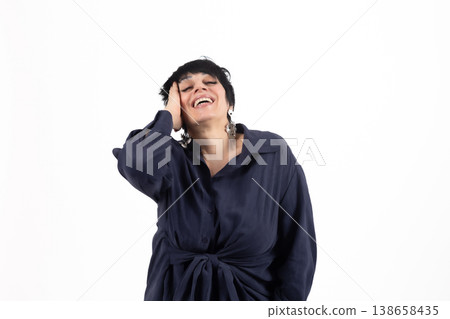 Expressive woman gesturing and looking away with smile 138658435