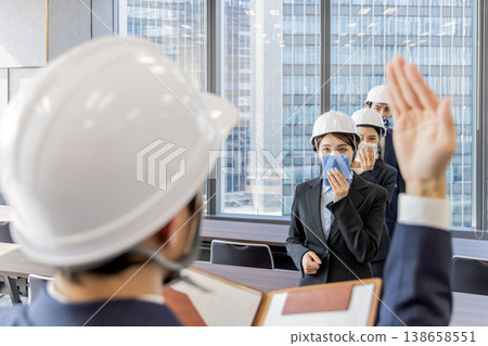 High-rise building evacuation drill High-rise building evacuation drill 138658551