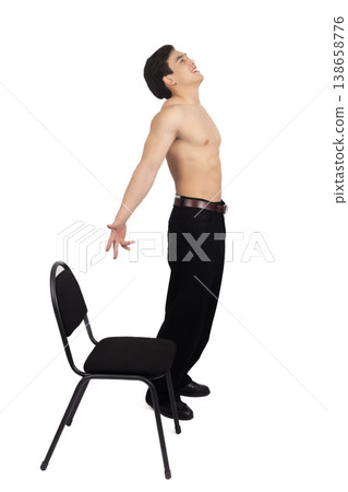 Fit man with bare chest leaning back in studio Fit man with bare chest leaning back in studio 138658776