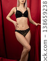 Full body shot of woman in black lingerie 138659238