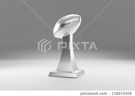 Silver trophy cup standing on a white round pedestal Silver trophy cup standing on a white round pedestal 138659306
