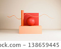 Creative product display with orange and red geometric shapes 138659445