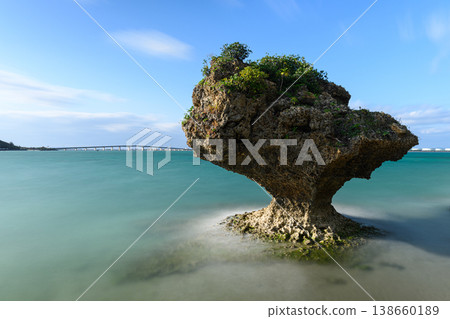 The rocks jutting out of the sea and the Hamahiga Bridge: A view from Amamichu's tomb The rocks jutting out of the sea and the Hamahiga Bridge: A view from Amamichu's tomb 138660189