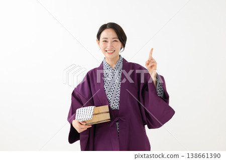 middle-aged woman in yukata middle-aged woman in yukata 138661390