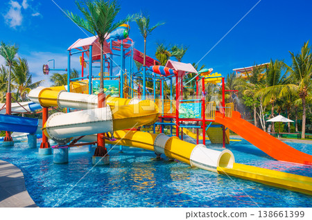 children's water park in the pool at resort on summer vacation. Colorful aquapark with slides for children in the pool 138661399