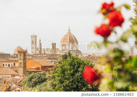 Florence cityscape with Duomo and Giottos Campanile framed by red flowers Florence cityscape with Duomo and Giottos Campanile framed by red flowers 138661483