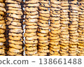 Taralli stacked in rows at a bakery for sale in Naples 138661488