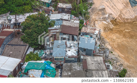 March 28 2026 Dense tin roof homes across Cha Kwo Ling, HK March 28 2026 Dense tin roof homes across Cha Kwo Ling, HK 138662193