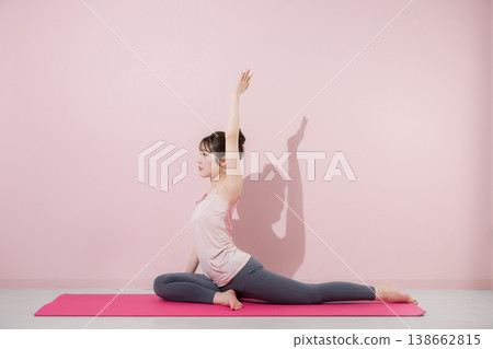 Women's fitness and stretching images for hip flexibility and core strength, including yoga and strength training for the whole body. Women's fitness and stretching images for hip flexibility and core strength, including yoga and strength training for the whole body. 138662815