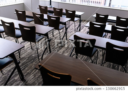 Conference tables and chairs lined up by the window Conference tables and chairs lined up by the window 138662915