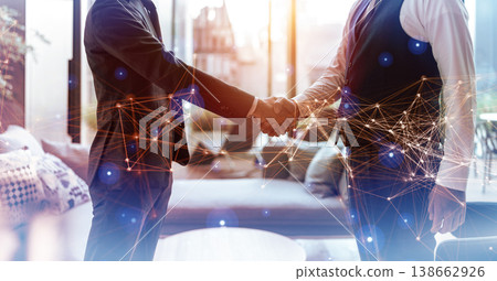 Businessmen agree with a handshake. Businessmen agree with a handshake. 138662926