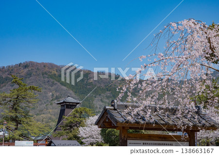The Tatsumi-koro Tower, a symbol of Izushi-cho, Toyooka City, and cherry blossoms in full bloom. The Tatsumi-koro Tower, a symbol of Izushi-cho, Toyooka City, and cherry blossoms in full bloom. 138663167