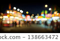 Magical Carnival Lights with Bokeh Effect Creating a Dreamy Cinematic View at Night 138663472
