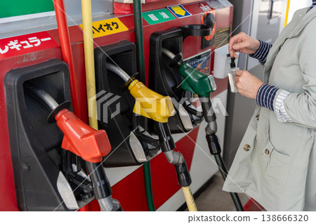 Color-coded fuel nozzles at gas stations Color-coded fuel nozzles at gas stations 138666320