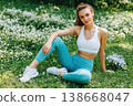 Young woman enjoying nature expressing wellness and healthy lifestyle 138668047