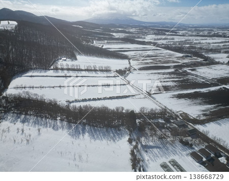 Aerial view of the rural landscape from Unabetsu Ski Resort in Shari Town, Hokkaido. Aerial view of the rural landscape from Unabetsu Ski Resort in Shari Town, Hokkaido. 138668729