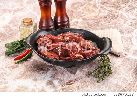 Raw uncokked chicken liver in the bowl Raw uncokked chicken liver in the bowl 138670138