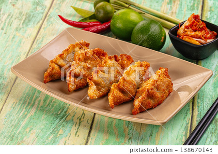 Asian fried stuffed dumplings gyoza Asian fried stuffed dumplings gyoza 138670143