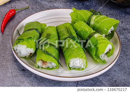 Vietnamese green nem spring rolls in leaf Vietnamese green nem spring rolls in leaf 138670217