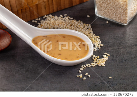 Asian sesame sauce with seeds Asian sesame sauce with seeds 138670272
