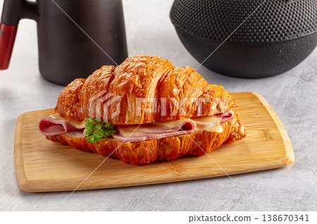 Croissant with ham and cheese Croissant with ham and cheese 138670341