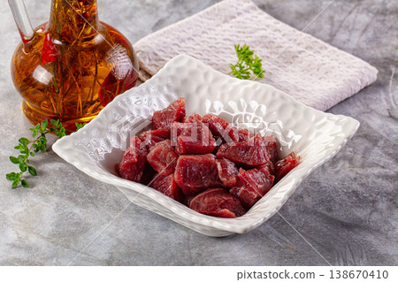 Diced raw beef meat cubes Diced raw beef meat cubes 138670410
