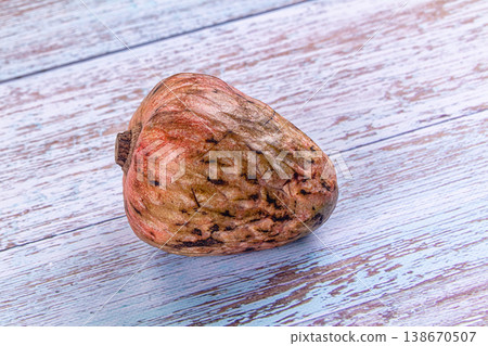 Exotic cherimoya fruit on a wooden table background 138670507