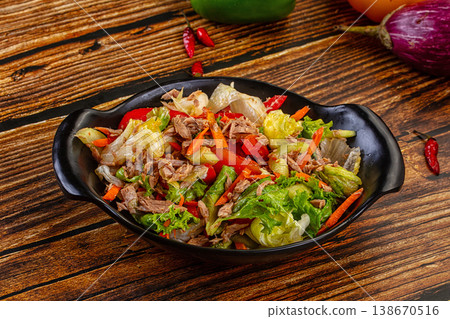 Fresh Tuna Salad with Vegetables in a Bowl on a Rustic Wooden Table Fresh Tuna Salad with Vegetables in a Bowl on a Rustic Wooden Table 138670516