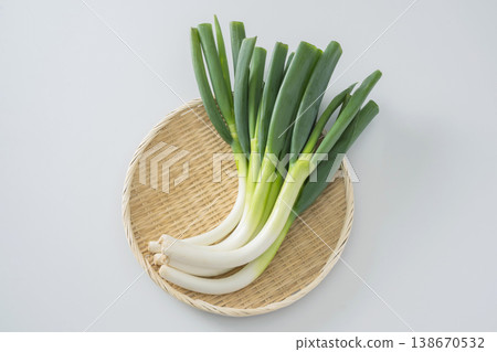 Bent green onion Bent green onion 138670532