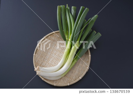 Bent green onion Bent green onion 138670539
