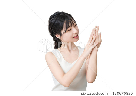 Japanese women applying hand cream to the back of their hands (skin care) Japanese women applying hand cream to the back of their hands (skin care) 138670850