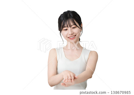 Japanese women applying hand cream to the back of their hands (skin care) Japanese women applying hand cream to the back of their hands (skin care) 138670985