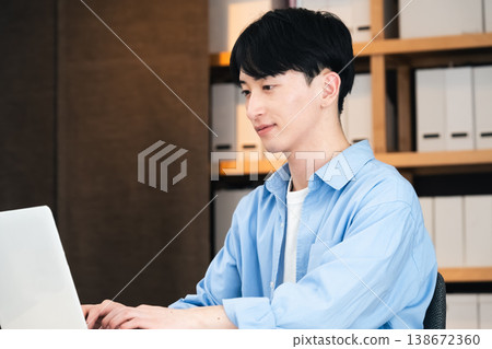 Businessman using a personal computer 138672360