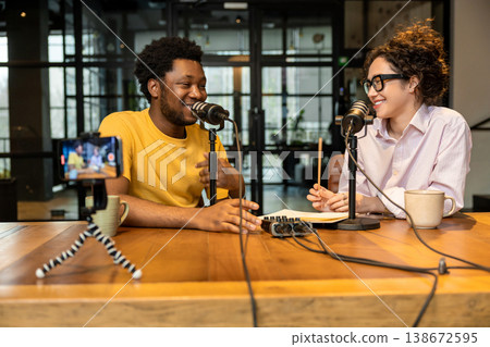 Creative team sharing stories during live video broadcast 138672595
