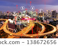 High angle view of city skyline at twilight with digital overlay of inflation text, rising arrows and global currency symbols, economic crisis concept. 138672656