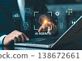 Businessman using laptop with AI Agents and brain processing icons, futuristic automation and machine learning technology for business efficiency. 138672661