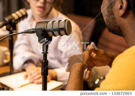 Close up of microphone with person talking on background 138672663