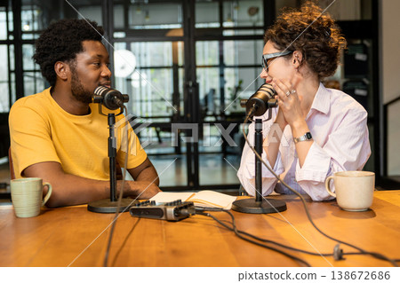 Diverse partners recording conversation for media project Diverse partners recording conversation for media project 138672686
