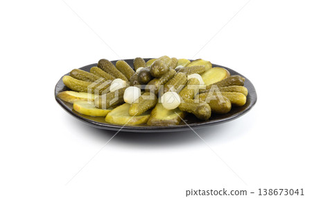 Pickled sliced cucumbers, fermented food, marinated canned vegetables, gherkins, pickles 138673041