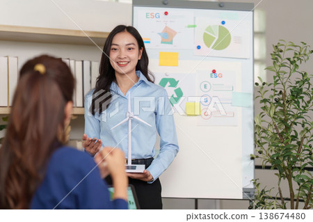 Professional presenting ESG and renewable energy concepts 138674480