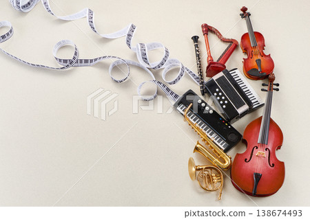 World music day. Musical instruments with flowing ribbon and notes 138674493