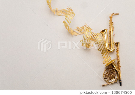 World music day. Golden musical instruments and flowing music notes 138674500